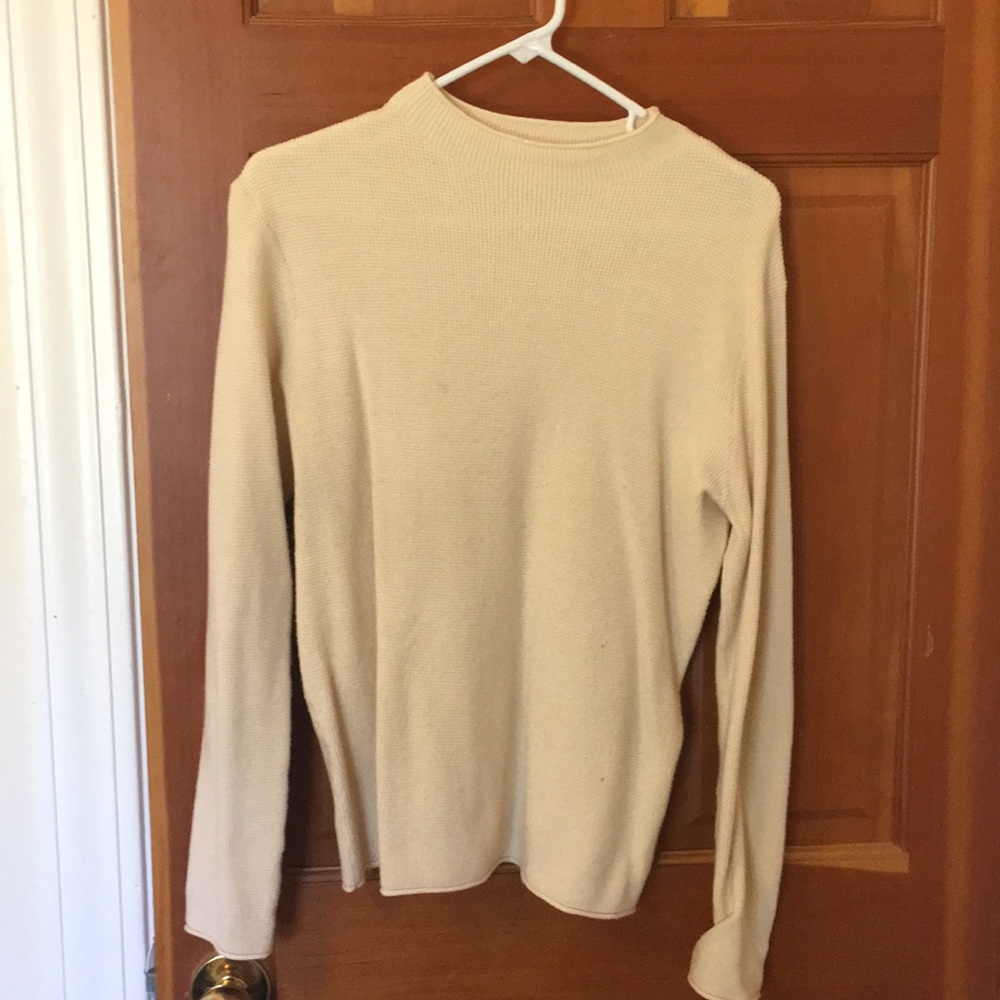 Small cream colored sweater